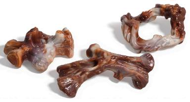 Three moulded chew toys in a ring, bone and knobbly shape shown together