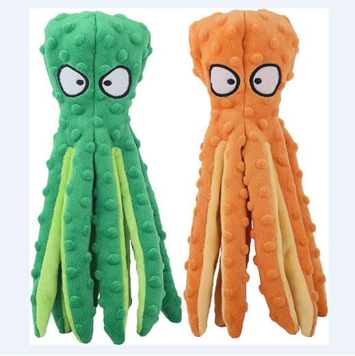 Plush octopus toy in green and orange with a dotted printed surface